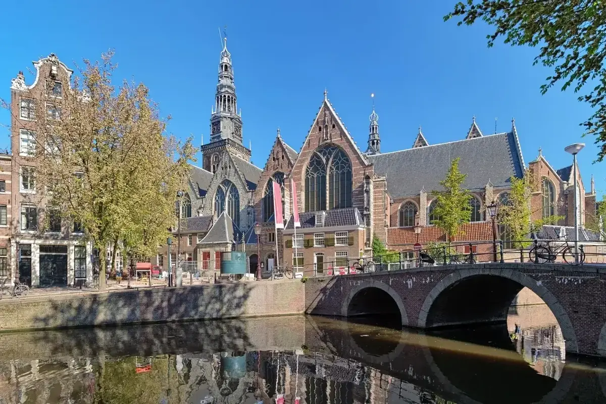 Amsterdam canal and historic houses in the Netherlands — tour packages from Pakistan